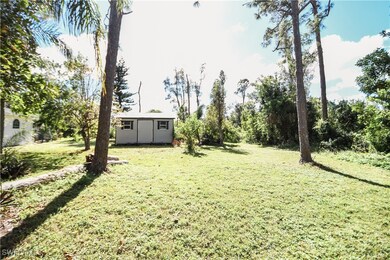 View of yard with a shed