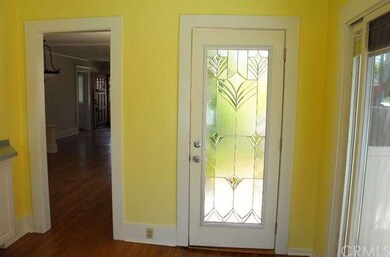 Looking to side door from informal kitchen sun roo