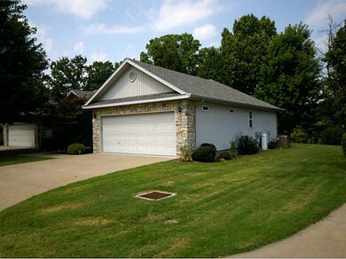 Exterior Front. concrete street and driveway