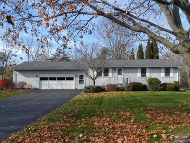 Large front lawn provides ample setback from stree