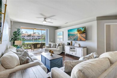 Living room featuring dark hardwood floors, ceilin