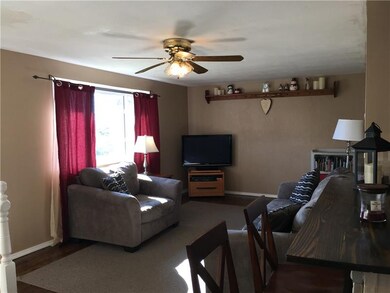 The main floor living room features restored hard 