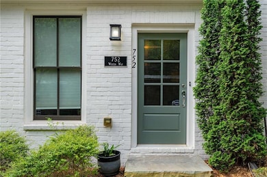 Property entrance with brick siding