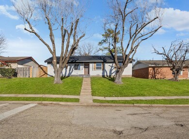 View of front of home featuring a front lawn