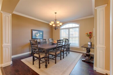 Dining room has plenty of room for 6 or more peopl