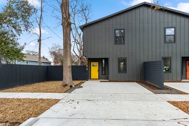 Side yard with a fence dividing the 2 units. ** PH