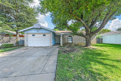 Single story home featuring driveway, an attached 