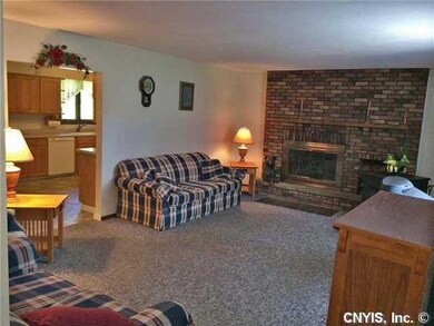 Living Room. Plus-size living room with a fireplac