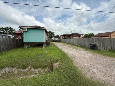 Fenced yard with driveway