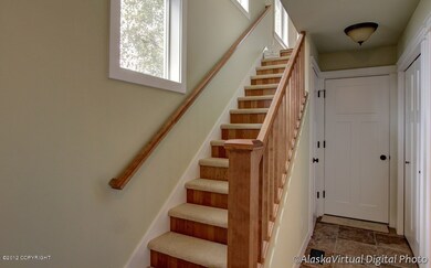 Staircase leading to 2nd level.