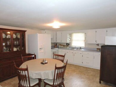 Kitchen appliances remain with the home.