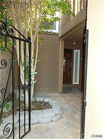 Gated entry to front court yard