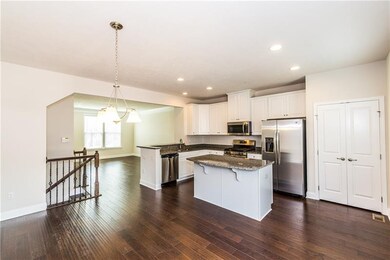 Open floor plan on this main level between dining,