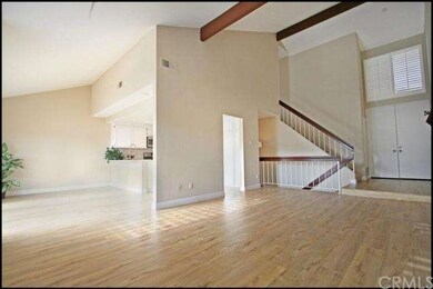 Living & dining room with exposed ceiling beams, n