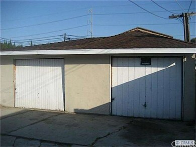 Garages, each with side window and door