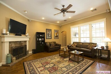 Spacious Great Room with large fireplace, hardwood