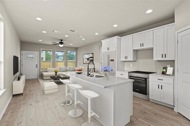 Kitchen with sink, a center island with sink, stai
