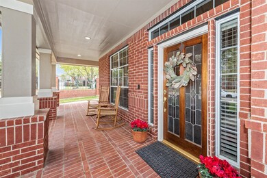 A closer look at the welcoming covered porch. Just perfect for your rockers.
