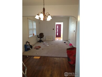 Open floor plan with wood flooring too.