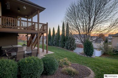 Back Yard has professional landscaping which adds to the home's beauty and offers additional privacy. The view to the west from the back of this home is second to none, especially front the vantage point on the covered deck.