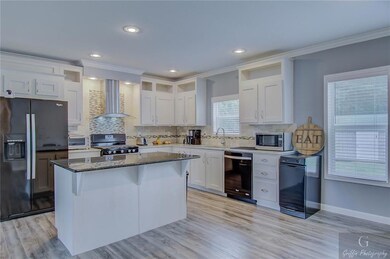 Kitchen with granite countertops...all appliances 