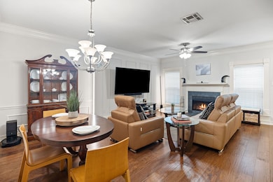 A dedicated dining space adds to this large living room.