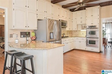 Ample space and storage in this open kitchen with 