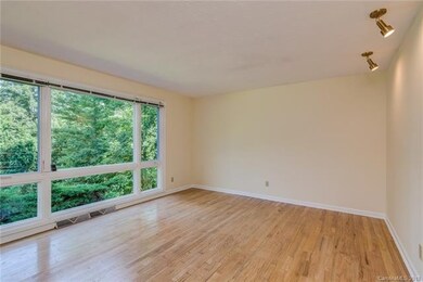 Bright and light living room with floor to ceiling