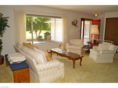 Formal living / front room with loads of light fro