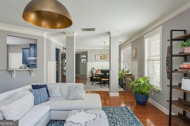 Open to the dining room and kitchen