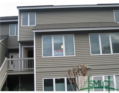 Exterior Front. front overlooks parking lot with t