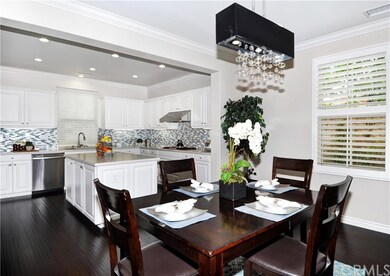 Gorgeous Kitchen and eating area with custom chand