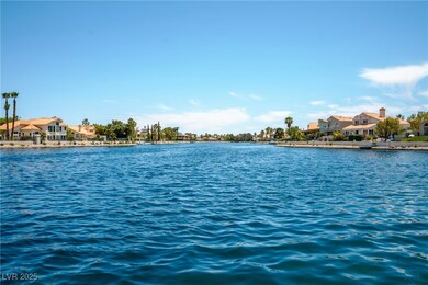 Water view with nearby suburban area