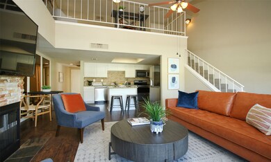VIEW OF LOFT:  The open ceiling in the living room