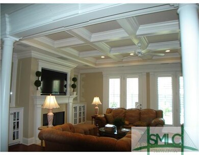 Den/Family/Great Room. Details include built-ins ,