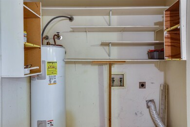 Utility room with water heater