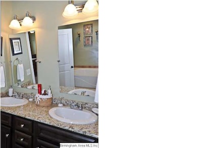 Master bathroom with double sinks, walkin closet
