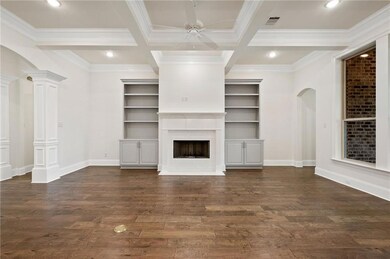 Gas burning Fireplace framed with Custom Mantle is