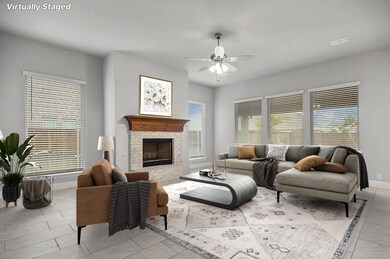 Living room featuring light tile patterned floorin