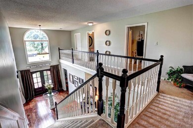Step inside the Grand Two Story Foyer lined with G