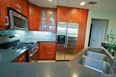 Custom kitchen with new cabinets, quartz counterto