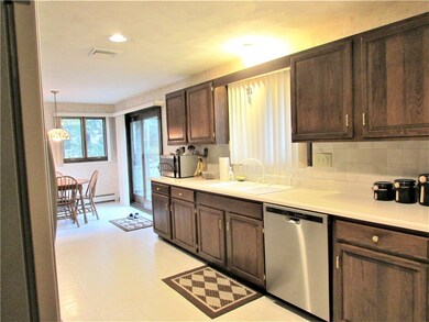 Kitchen with lots of cabinets.