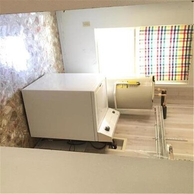 Laundry Room and Hot Water tank.