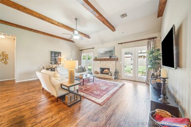 Open concept with handscraped hardwood floors and