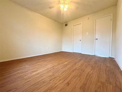 Unfurnished bedroom featuring a textured ceiling,