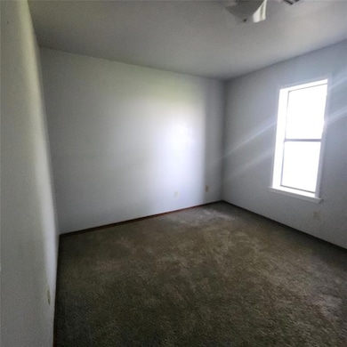 Bedroom with carpet flooring