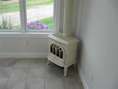 sunroom with gas stove