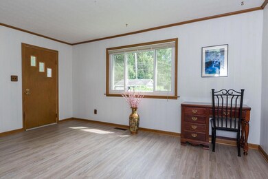 Den with beautiful picture window