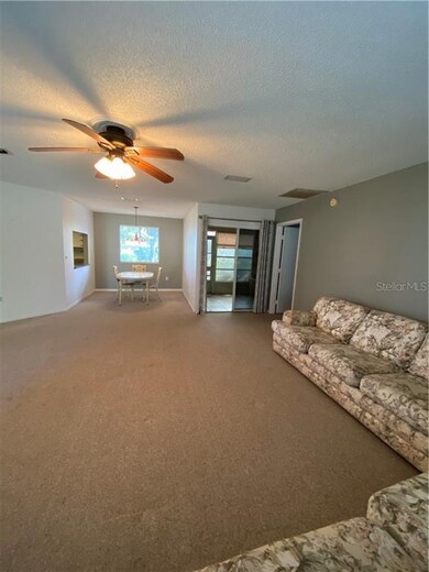 LIVING ROOM, DINING ROOM, SLIDERS TO LANAI