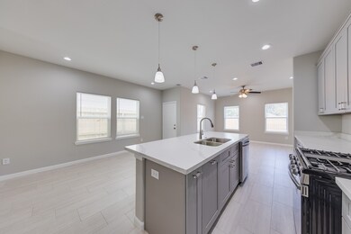 This kitchen comes equipped with essential stainle